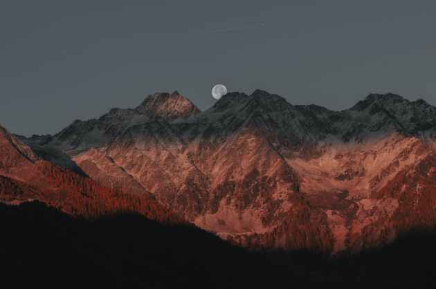 mountains behind fullmoon